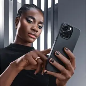 best perfume company in dubai a modelling girl looking to phone with her hands