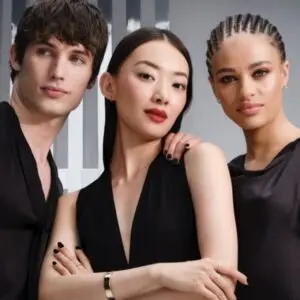 best perfume company in dubai with three modelling standing together